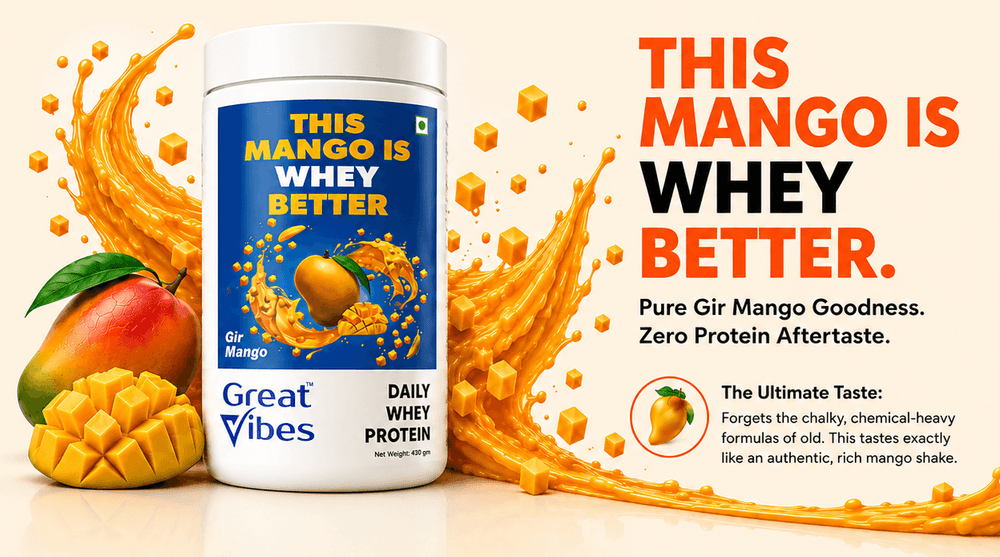 Great Vibes Daily Whey Protein main promotional banner titled This Mango Is Whey Better. Features a 430g jar of Gir Mango flavor next to a fresh sliced mango with dynamic liquid mango splashes and floating mango cubes. Explanatory text reads: Pure Gir Mango Goodness. Zero Protein Aftertaste. The Ultimate Taste: Forgets the chalky, chemical-heavy formulas of old. This tastes exactly like an authentic, rich mango shake.